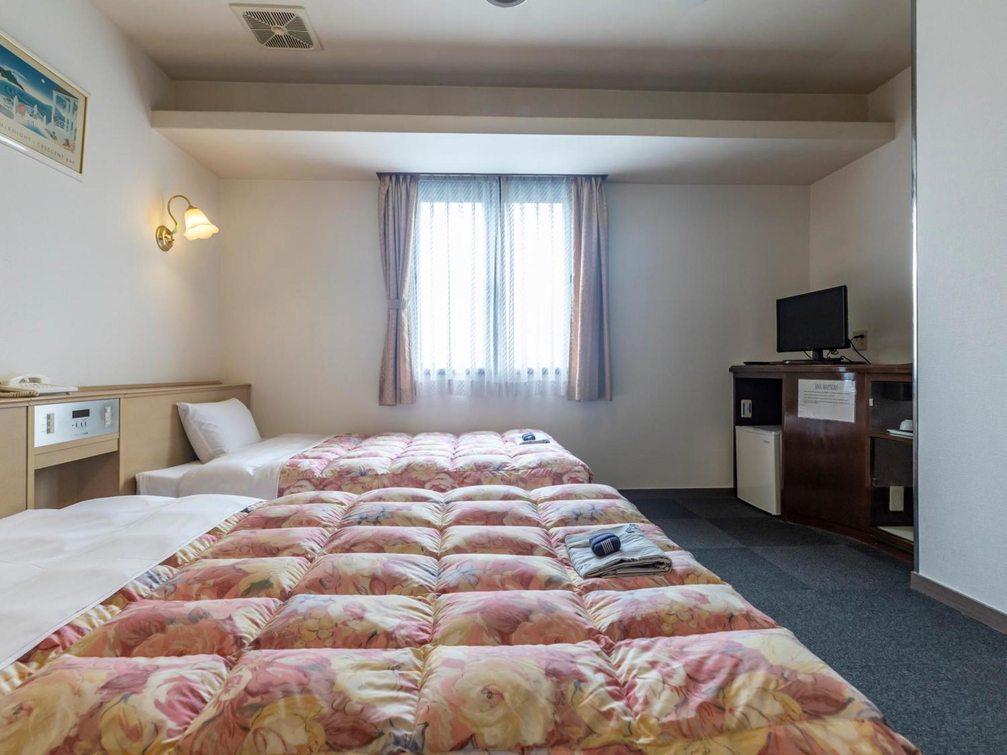Hotel Tabist Annex Matsumi Beppu Zimmer foto