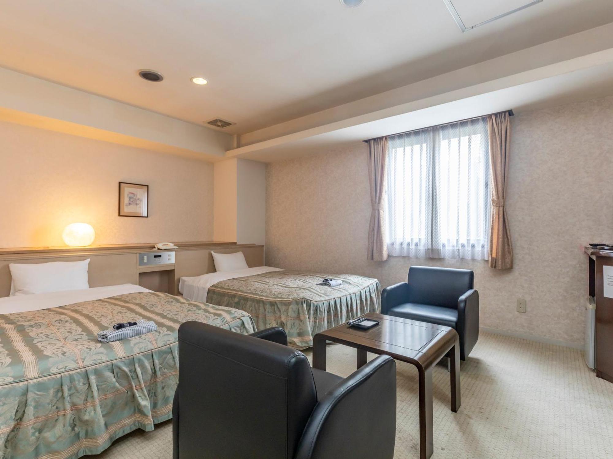 Hotel Tabist Annex Matsumi Beppu Zimmer foto