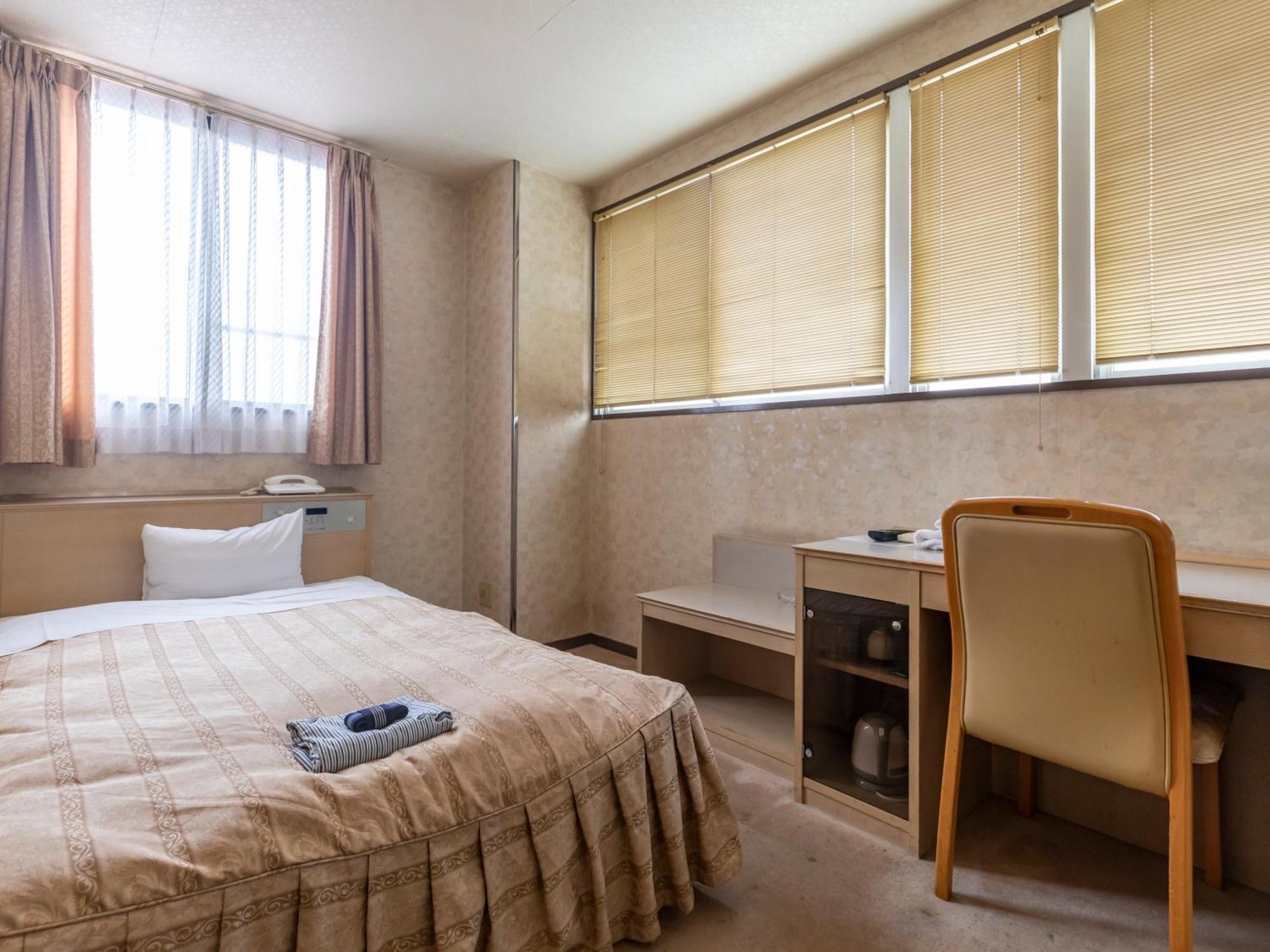 Hotel Tabist Annex Matsumi Beppu Zimmer foto